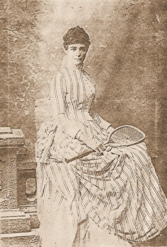 Minnie Pitt with a tennis racket, before her marriage.