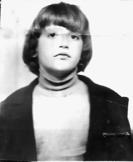 Me at eleven, in my sixth-grade ID card picture.