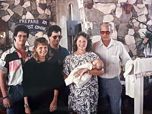 Juliet’s baptism at St Gerard’s, Anguilla, 1989. From left: Chantal’s brother Gregory, Chantal, her brother Michael, her mother Carolyn holding Juliet, and her father, Alan Permuy. Two years later Chantal and I were married in the same church.