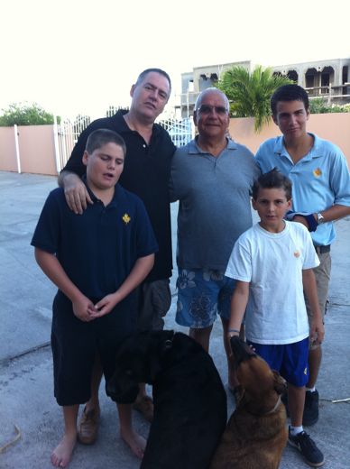 The boys, in their Caribbean International Academy school shirts, with my uncle, Don Mauro, December 2011.