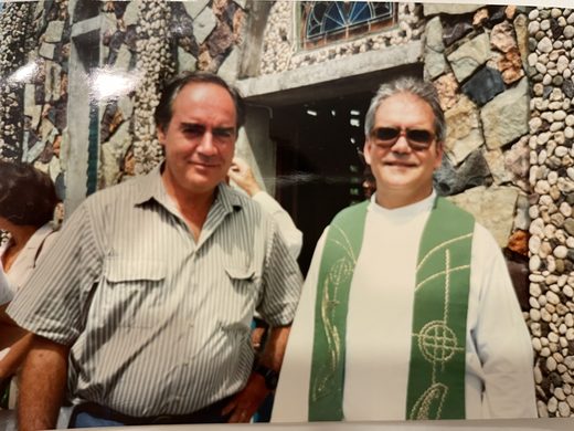 Dad with Don Mauro in front of St. Gerard's Catholic church in Anguilla.