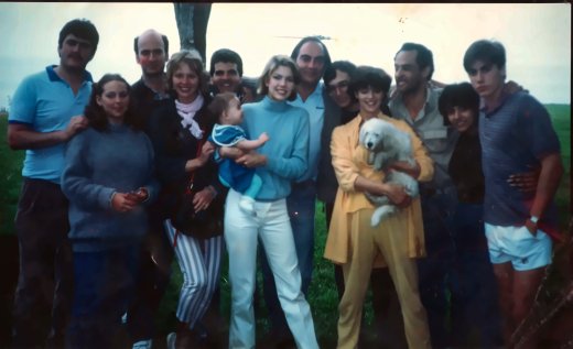 Hinchingham, around 1984. From left: me, Lisa, someone I can’t name, Kim Charlton, Joey Hunter, Kire with baby Tara, my father, James Kravitz, Robin Rock, two more I can’t name, and my brother Robin. The helicopter’s blades are just visible above my father’s head.