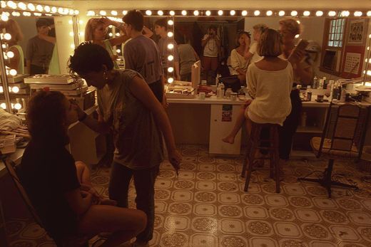 Kire, far left, doing makeup at the Model Workshop. She had come through the Workshop herself as an aspiring Ford model, and stayed on.