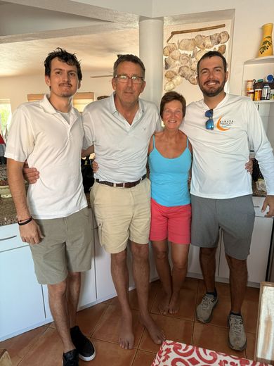 Peter Tromp and Lucy with Alessandro and Johnny at our home, December 2025. Peter was one of our very first island friends.