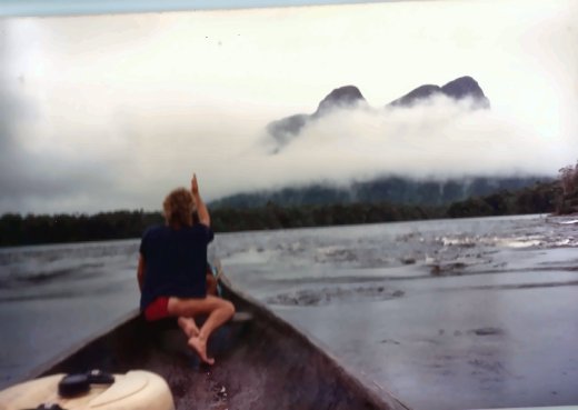 In the bow of our dugout, pointing towards the table mountains in the clouds.