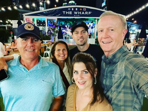 Chantal and me with our friends Dianne and Matthias Kammerer at The Wharf in Miami, 2023, where their son Tias, who plays as DJEMKAY, was playing that night. In July 2025 we saw Coldplay with them in Miami, at Hard Rock Stadium.